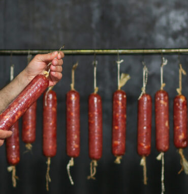 massive-sausage-producted-hanged-inside-factory